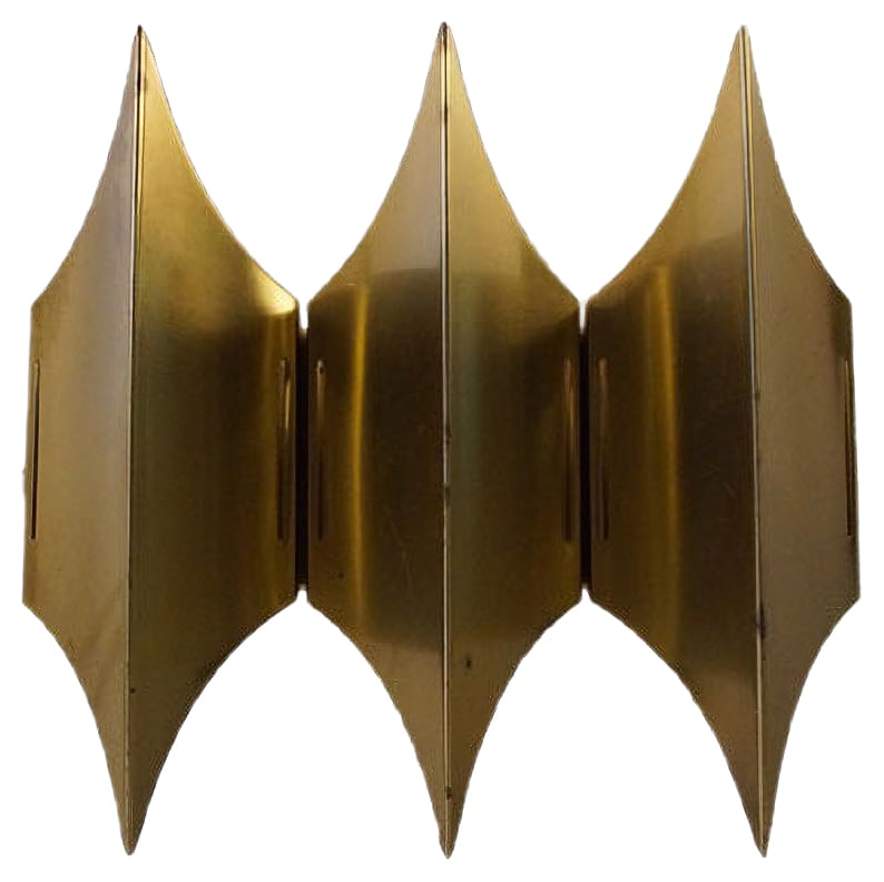 Gothic III Brass Sculptural Modernist Sconce from Lyfa, 1960s: Gothic III sconce produced by Lyfa, Denmark in the 1960s. This piece of Scandinavian design is made of brushed solid brass that accentuates the three horizontal crests. The sconce recalls European got