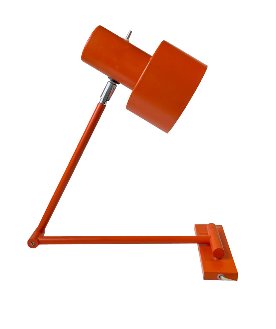 Jo Hammerborg Orange Scale Swing Arm Wall Lamp for Fog & Mørup, 1970s: A rare swing arm wall sconce or table lamp in its original orange color. It is called Skala and was designed in 1969 by Jo Hammerborg and manufactured by Fog & Mørup in Denmark from 1969-75.