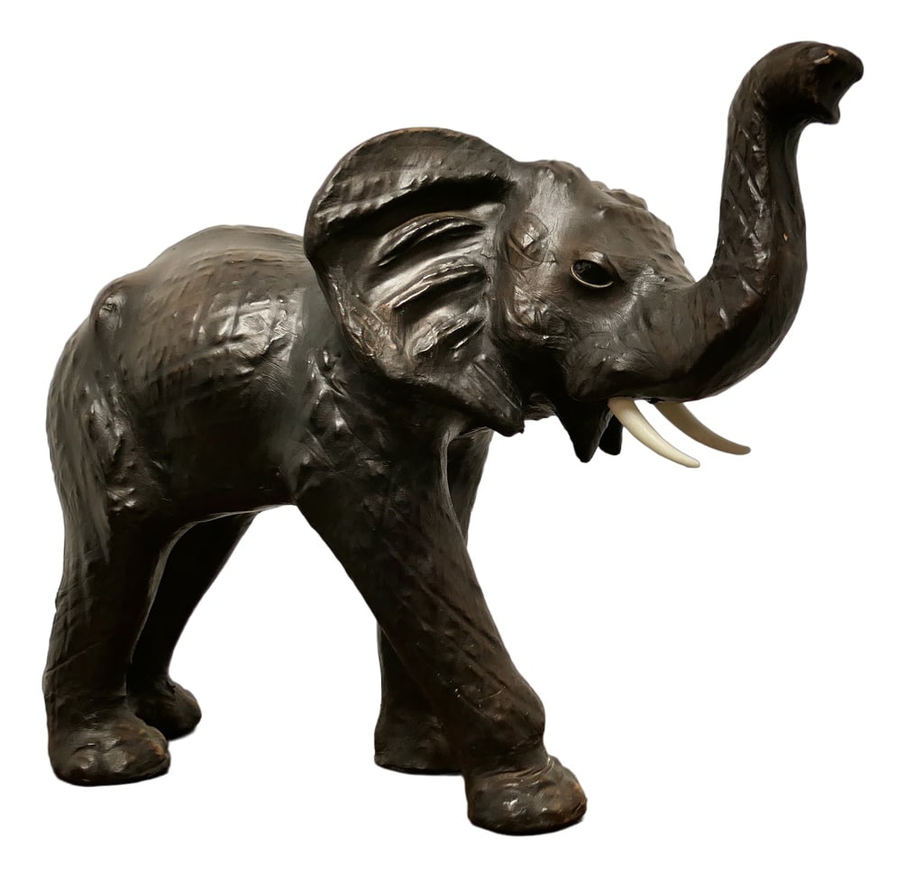 Arts and Crafts Elephant Model in Leather, 1930: Arts and Crafts Leather Model of an Elephant This is a rare and beautiful find from the early part of the 20th Century, it was made for Liberty and is known as “Junior Bull”This hansom bea
