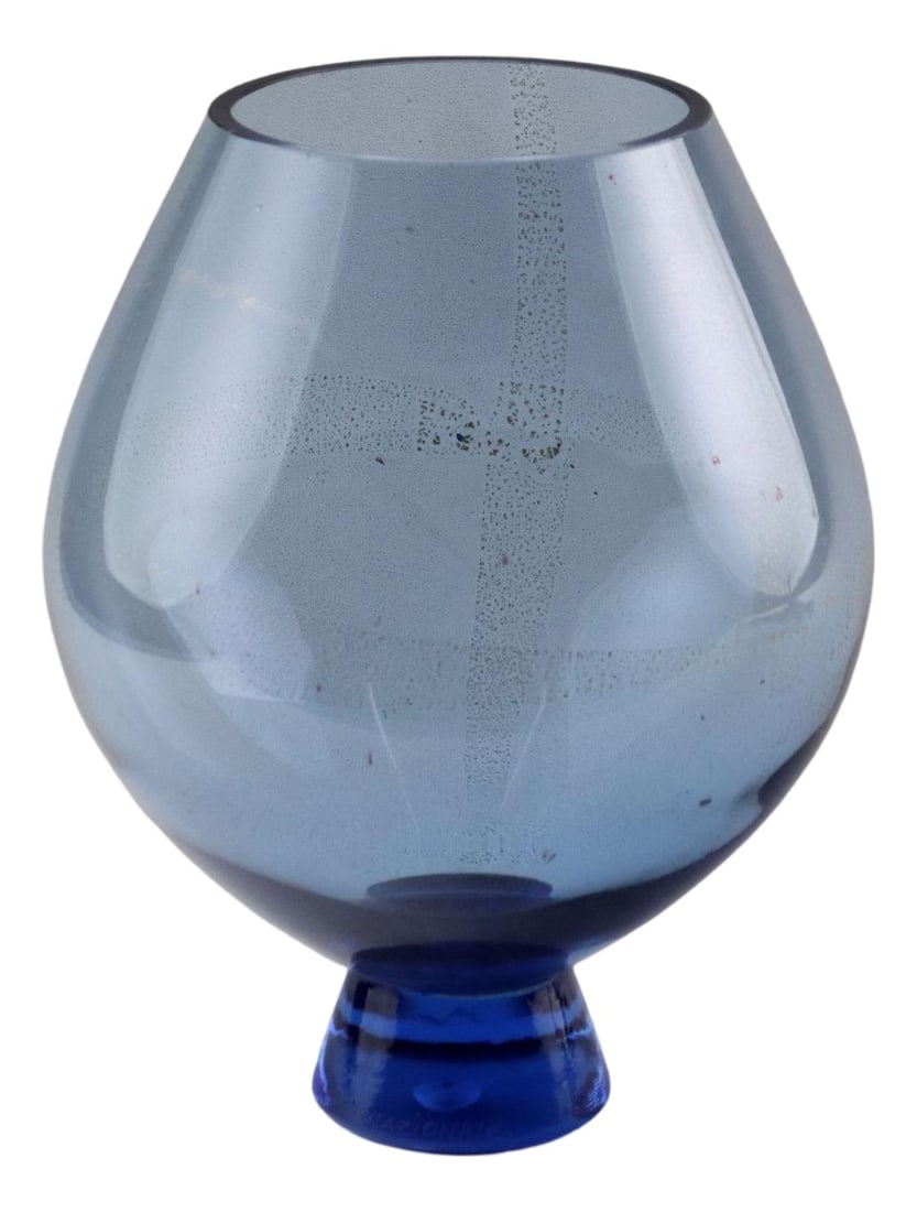 Glass Vase from La Murrina: Blue glass vase with gold leaf inclusions. Under the manufacturer's brand. On the base written engraved 'La Murrina, F.C. International, Christmas 2001'. Country of Manufacture: Italy Production Perio