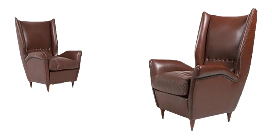 Model 512 Armchairs by Gio Ponti, Set of 2: Pair of 2 spectacular Wingback Lounge armchairs in brown leather on stained wood legs, loose sitting cushions. 1950s. The mastery of Italian architecture and design icon Gio Ponti, aristocratic and sl