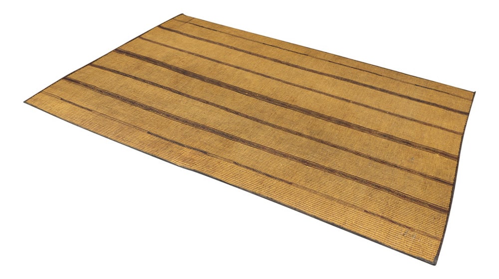 Antique Saharan Tuareg Mat, 1890s: These mats were used by the Tuareg nomads in the Saharan desert, between Mali and Mauritania. They were made by weaving long strips of camel leather, dyed with natural colors, together with thin