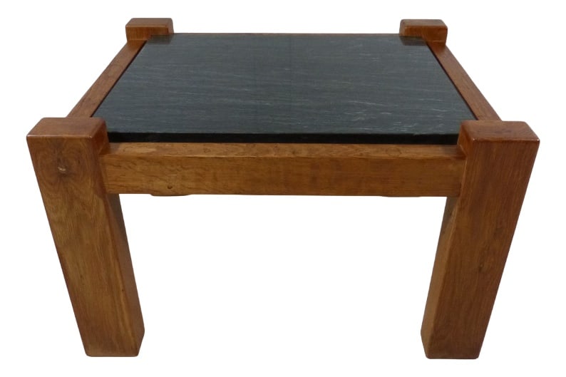 Brutalist Coffee Table in Oak & Stone, 1970s: Nice sturdy brutalist coffee or side table.Solid oak wooden frame, black natural stone tabletop.The corners of the tabletop are integrated in the legs.1970’s. In good condition, the wood has pat