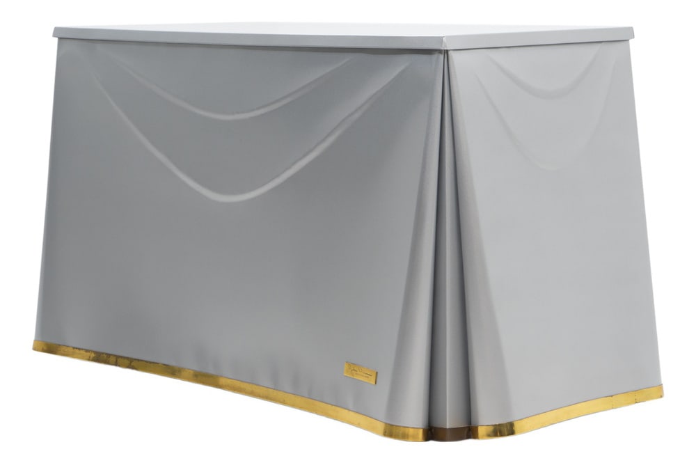 Draped Table by J. Dickinson for Sutherland, 1970s: This sculptural table by John Dickinson is crafted from galvanized steel, meticulously formed to resemble flowing draped fabric. Brass trim outlines the contours of the piece, while an internal steel