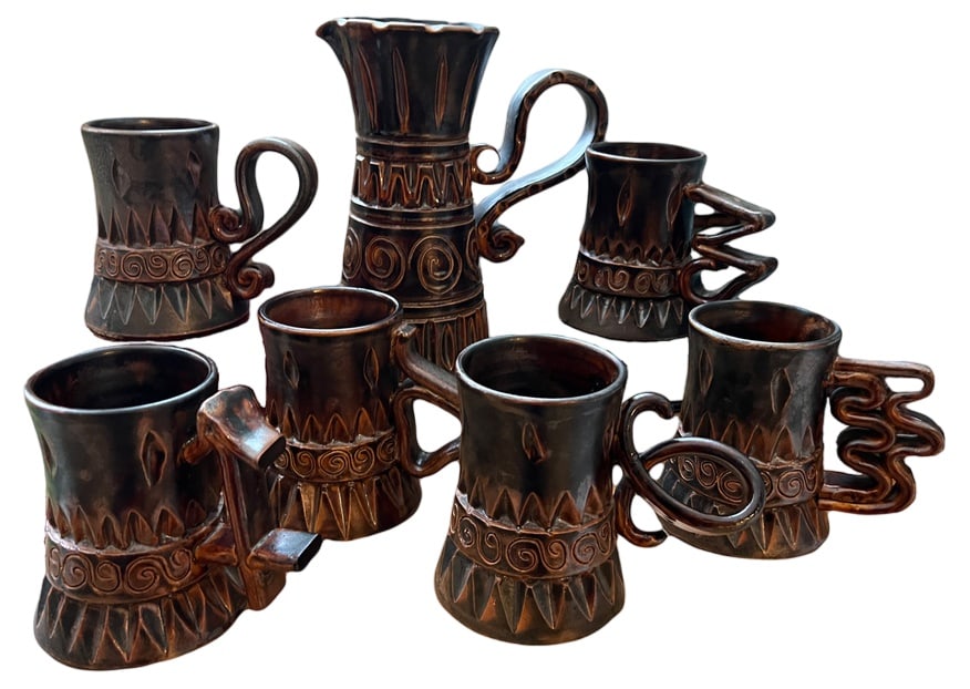 Glass Pitcher Set by H. and M. Bessone, Set of 7: Orangeade Set by Huguette and Marius BessoneA rare creation by the couple.Pitcher set with 6 glasses in glazed brown ceramic featuring a rich incised graphic design inspired by tribal motifs,