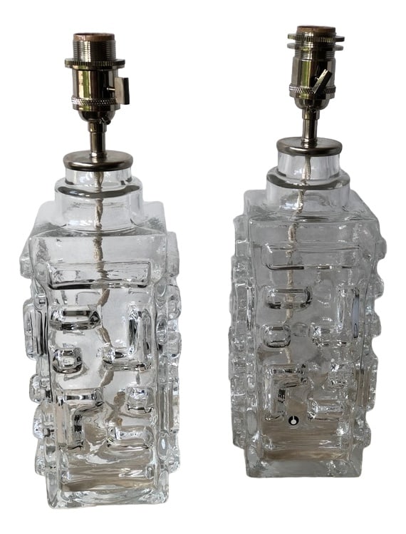 Swedish Pukeberg Table Lamps, 1960s, Set of 2: Set of 2 Swedish Modernist Ice Glass Table Lamps by Pukeberg Glass Company. 1960s.Mid-Century Modern Lamps with in Clear Glass with a Textured, Graphic Abstract Design Pattern. New wiring, let us
