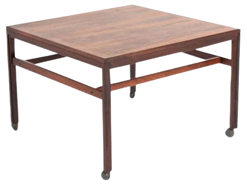 Danish Rosewood Coffee Table, 1970s: Vintage rosewood veneer coffee table from 1970s produced by Haslev Mobelfabriek, equipped on wheels. Condition Fair, some marks. Production Period: 1970 to 1979 Additional Condition Information: