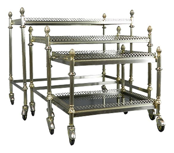 Mid-Century French Nesting Tables, Set of 3: This very smart set of French trolleys are designed in the Maison Jansen style and comes in three descending sizes. They each have decorative finials to the top of each corner and each tray has a