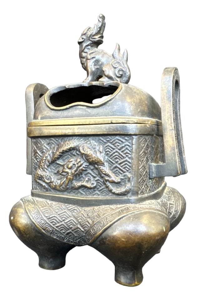 Chinese Bronze Perfume Burner with Dog and Dragon: Chinese Bronze Perfume Burner with a Dog and Dragon, Late 19th Century Country of Manufacture: China Design Period: before 1890 Restoration and Damage Details: Light wear consistent with age and use