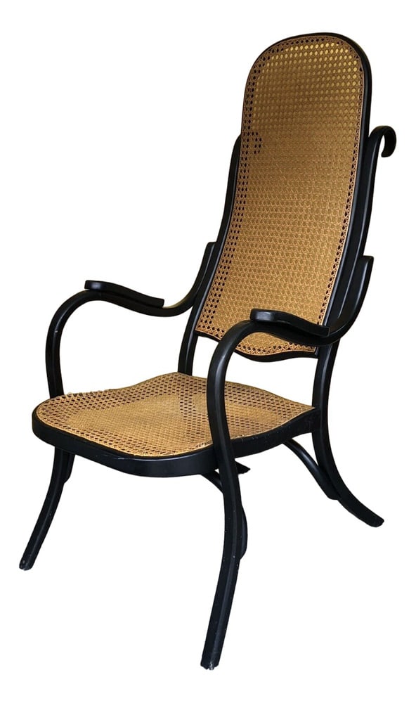 Antique Fireside Chair from Thonet, 1904: This original Thonet fireplace chair, model no. 51, comes from Gallery 2 and is an impressive example of Thonet's masterful design and craftsmanship from the early 20th century. The armchair, which