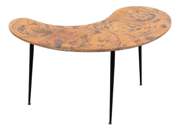 Mid-Century Italian Sculptural Side Table, 1950s: Unique 1950s side table/coffee table produced in Italy. It has black coated steel legs with unique curved veneered table top featuring painted Circus artists/ clowns faces. Condition Good, age