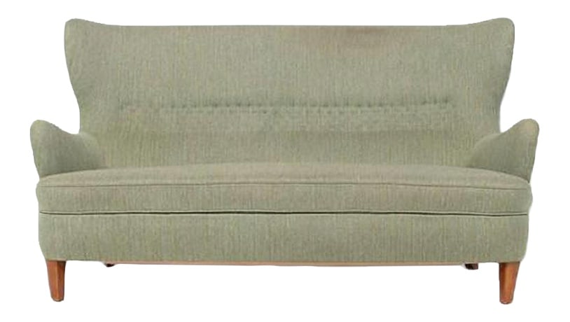 Swedish Wing Sofa from Carl-Axel Acking: Very rare imposing wingback sofa from the pioneer of the Swedish modern movement Carl-Axel Acking. Stained wood legs with wool fabric upholstery. Condition Good, age related wear and marks. Country