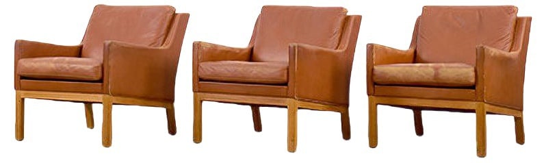 Easy Chair by Ekselius for JOC Vetlanda, 1960s: This special rare chair was designed by Karl Erik Ekselius for J.O. Carlsson, in Sweden during the 1960s. The club chair has a wooden construction upholstered in cognac colored leather. The simple