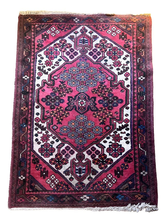 Vintage Middle Eastern Rug, 1970s: Hand -knotted wool rug with floral decor from the 70s.A small white spot to report (photographed) Country of Manufacture: United Arab Emirates Design Period: 1970 to 1979 Production Period: 1970 to