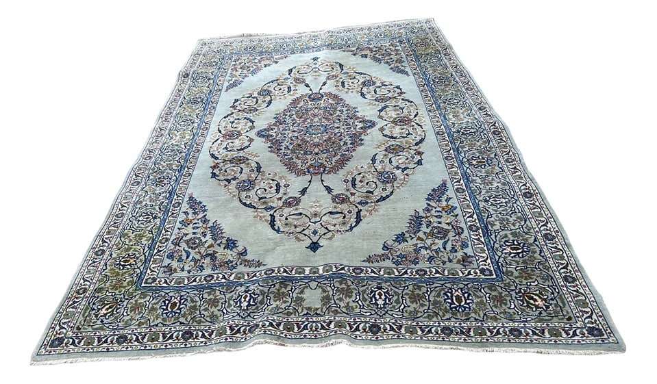 Vintage Middle Eastern Rug, 1970s: Vintage rug from the 70s in wool and natural silk, hand-woven and hand-knotted shades of blue, green and beige. Country of Manufacture: United Arab Emirates Design Period: 1970 to 1979 Production