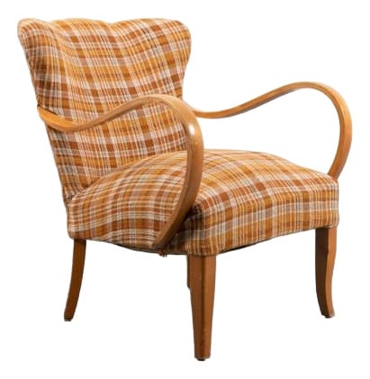 Scandinavian Modern Sculptural Armchair, 1950s: Mid-Century Modern sculptural armchair from 1950s. Frame in varnished birch, upholstered in original striped brown fabric. Condition: Good, age related wear and marks. Country of Manufacture: Denmark