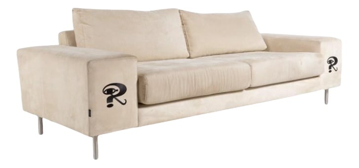 Raun Home Sofa from Robbie Williams: Unique ‘Raun Home’ sofa upholstered in beige alcantara fabric, brushed steel legs. It was specially made for Robbie Williams when he gave a concert in Denmark in 2006. Tour logos are