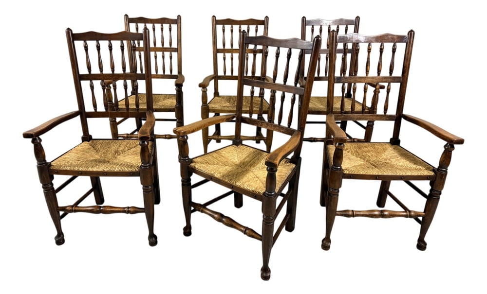 Lancashire Dining Armchairs, 1890s, Set of 6: Set of 6 beautiful Lancashire dining chairs.Wooden frame with nice back rest, rush seat.1900’s. In good condition with nice patina, 1 chair has a crack inthe rear leg wich does not affect the