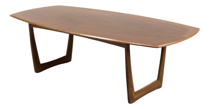 German Coffee Table from Kondor Möbel, 1960s: This elliptical table was manufactured by the German company Kondor Möbel during the 1960s. It was made of walnut wood in a warm shade of brown. An additional advantage is the crossed table legs