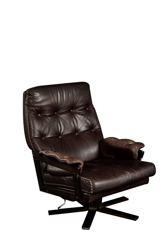 Scandinavian Modern Executive Swivel Chair, 1970s: This modernist armchair was made in Denmark during the 1970s. The frame of the armchair is made of wood. It is upholstered in high-quality, soft, dark brown natural leather. The base is a rotating