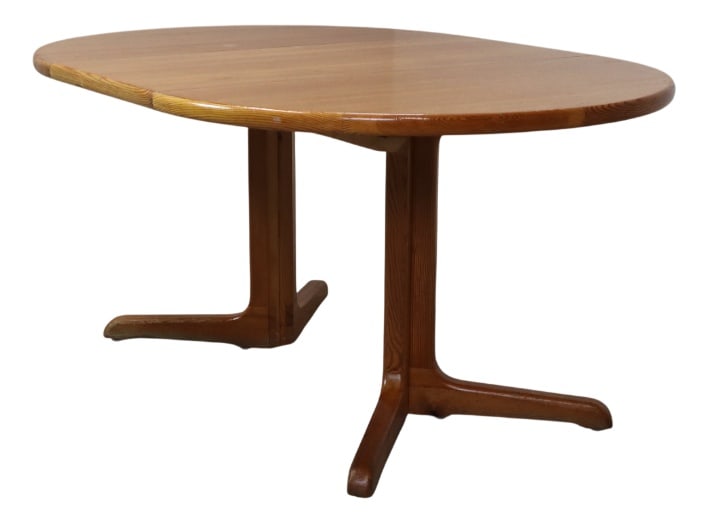 Scandinavian Pine Extendable Dining Table, 1960s: Bring a warm Scandinavian feel into your home with this extendable dining table made of solid pine. The rounded organic shape, soft edges, and natural wood grain give it that authentic Scandinavian