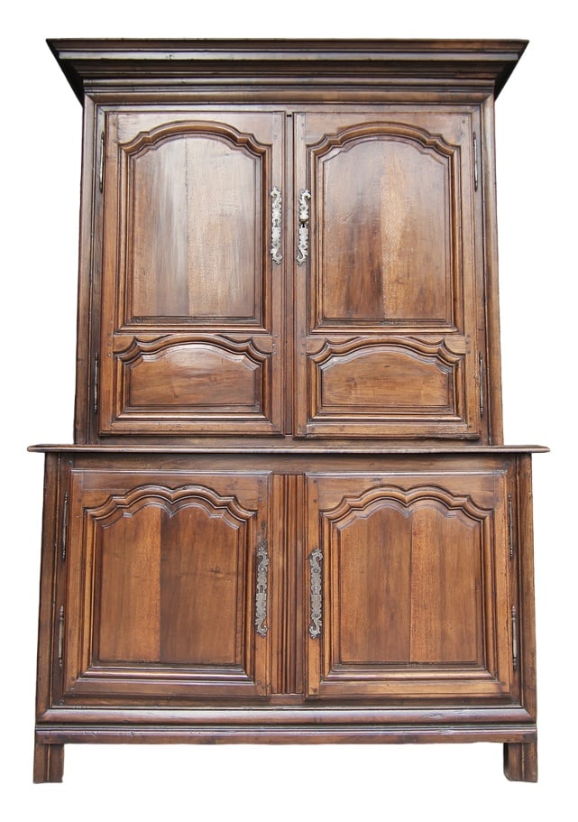 French Buffet À Deux Corps in Walnut: French buffet à deux corps or cabinet in Louis XIV style. Early 19th century. Made from solid walnut.Two-part side-coffered walnut body consisting of a base cabinet with a slightly protruding pro