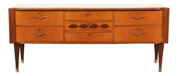 Sideboard from Arredamenti Falcieri, Verona: Beautiful Italian Mid-Century design sideboard/chest of drawers from 1950s. It features 7 drawers, top with a marble inlay, brass feet covers. Condition: Fair, age related wear and marks. Design