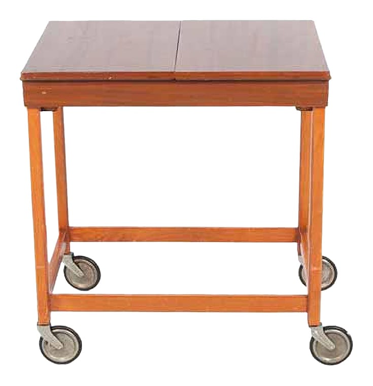 Scandinavian Side Table on Wheels, 1960s: Side table/storage table on wheels with walnut veneer top and varnished maple frame. It has a storage space under the flap top, the loose tray with small storage units can be taken out. It can serve a