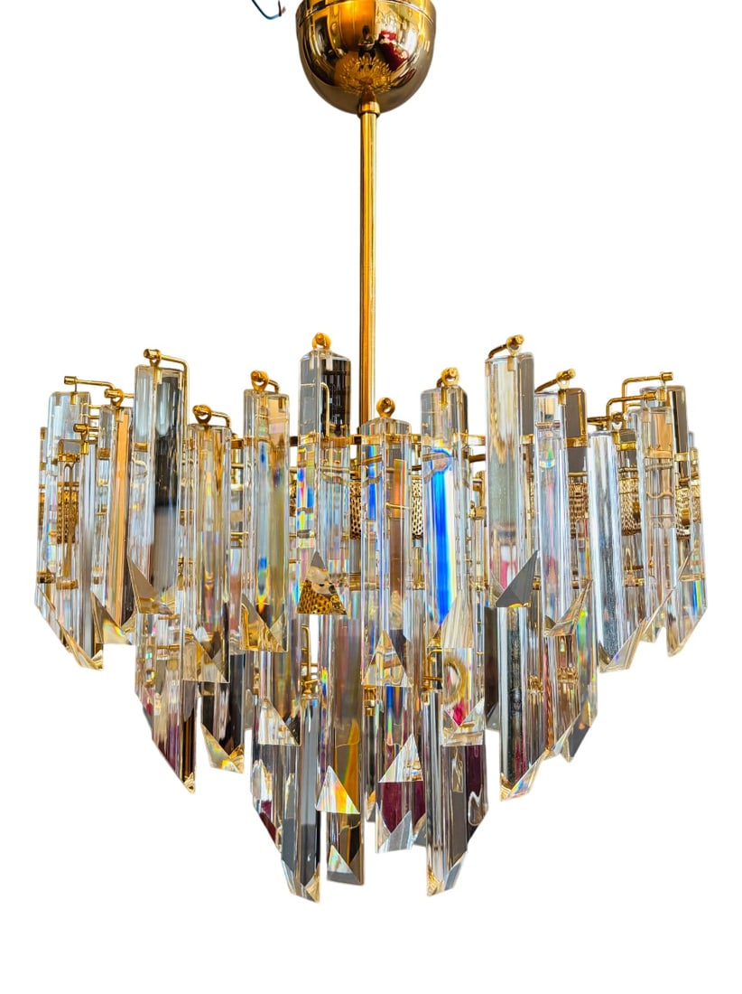 Cristal Triedri Murano Glass Chandelier by Venini: Cristal Triedri Murano Glass Chandelier by Paolo Venini for Venini, 1980sStructure in perfect condition with gold plating. Original spare parts and replacement bulbs are supplied, for free. Ready to H