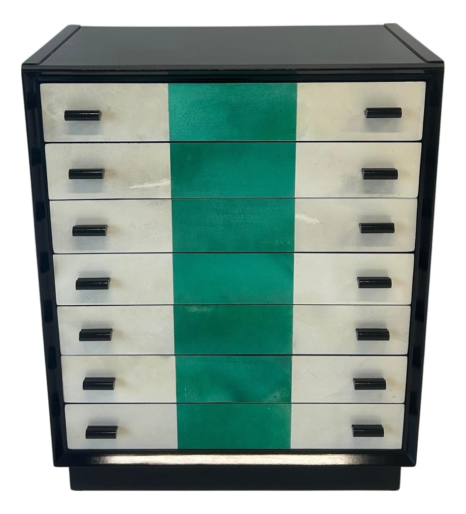Black Lacquer & Parchment Chest of Drawers, 1950s: Elegant Italian chest of drawers from the 1950s, featuring a refined black lacquered structure. The drawer fronts are clad in fine natural parchment, accented by a slim central strip in green