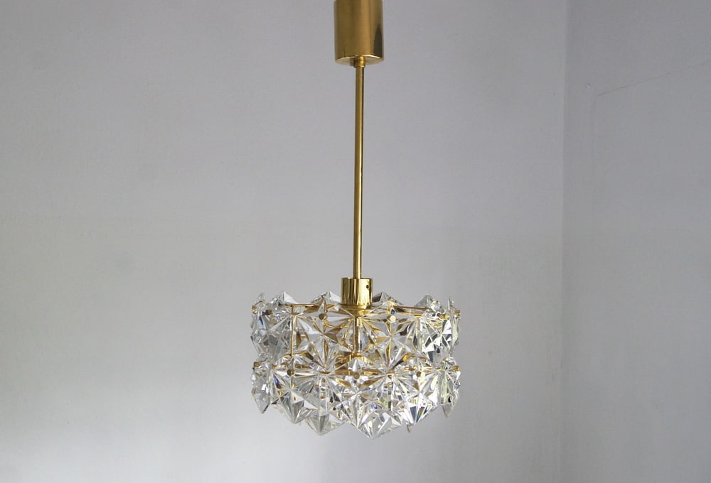 Chandelier Royal Kristall from Kinkeldey, 1960s: Beautiful large and original mid century chandelier by Kinkeldey from the Royal Kristall series. 2 tier chandelier with brass frame. Individual circles decorated with crystals. Equipped with 3 E14