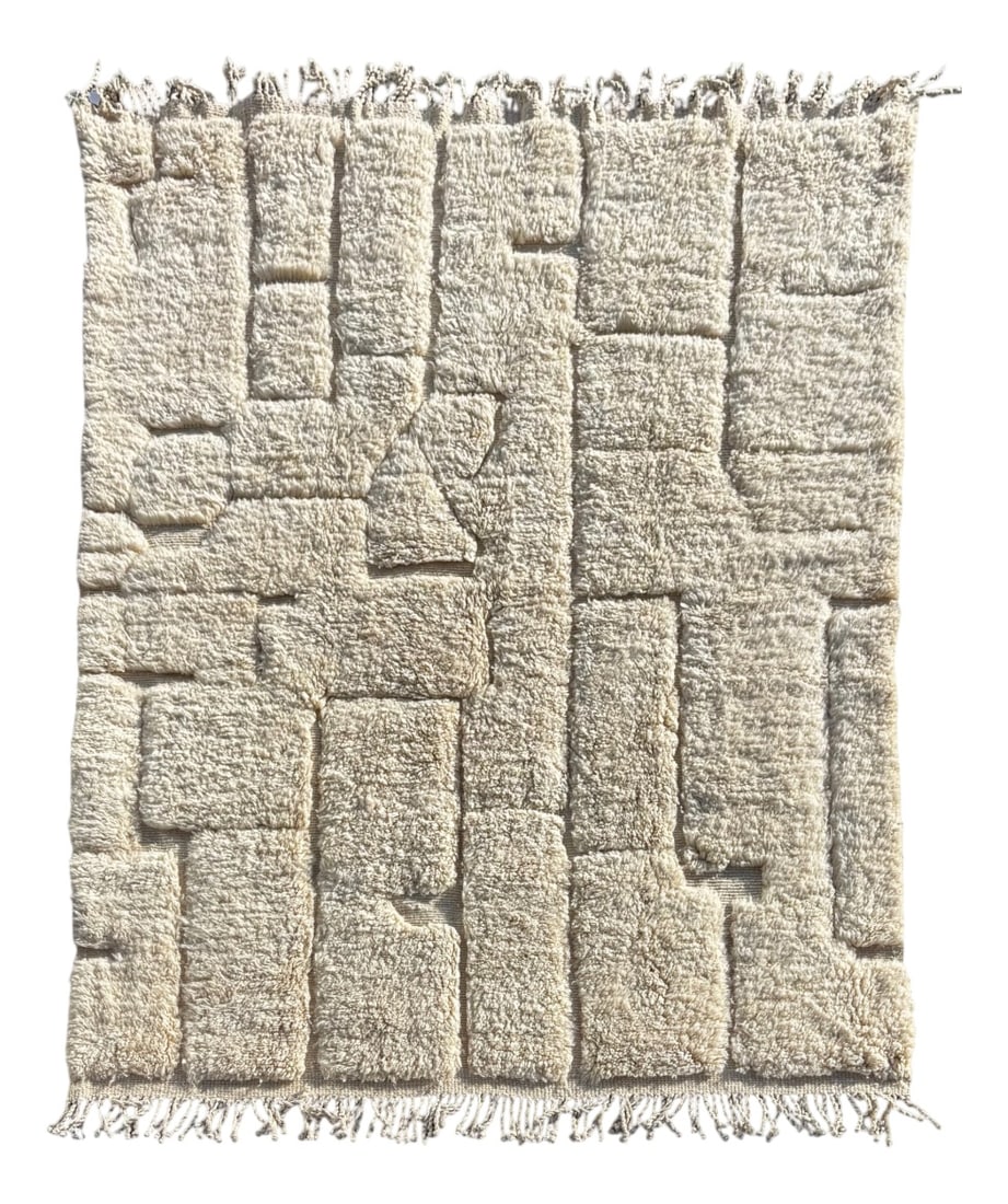 Large Moroccan Mrirt Beni Ouarain Wool Rug, 1990: This Moroccan Mrirt Beni Ouarain rug is a handwoven piece created by skilled artisans from the Middle Atlas region of Morocco. Mrirt rugs are highly valued for their exceptional wool quality, dense