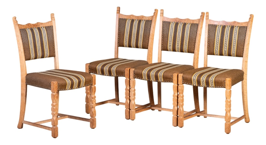 Vintage Danish Oak Chairs, 1960s, Set of 4: These beautiful antique chairs are crafted from solid oak, featuring intricate scrollwork and exquisite detailing. Dating back to the 1950s, they are in great condition, showcasing timeless