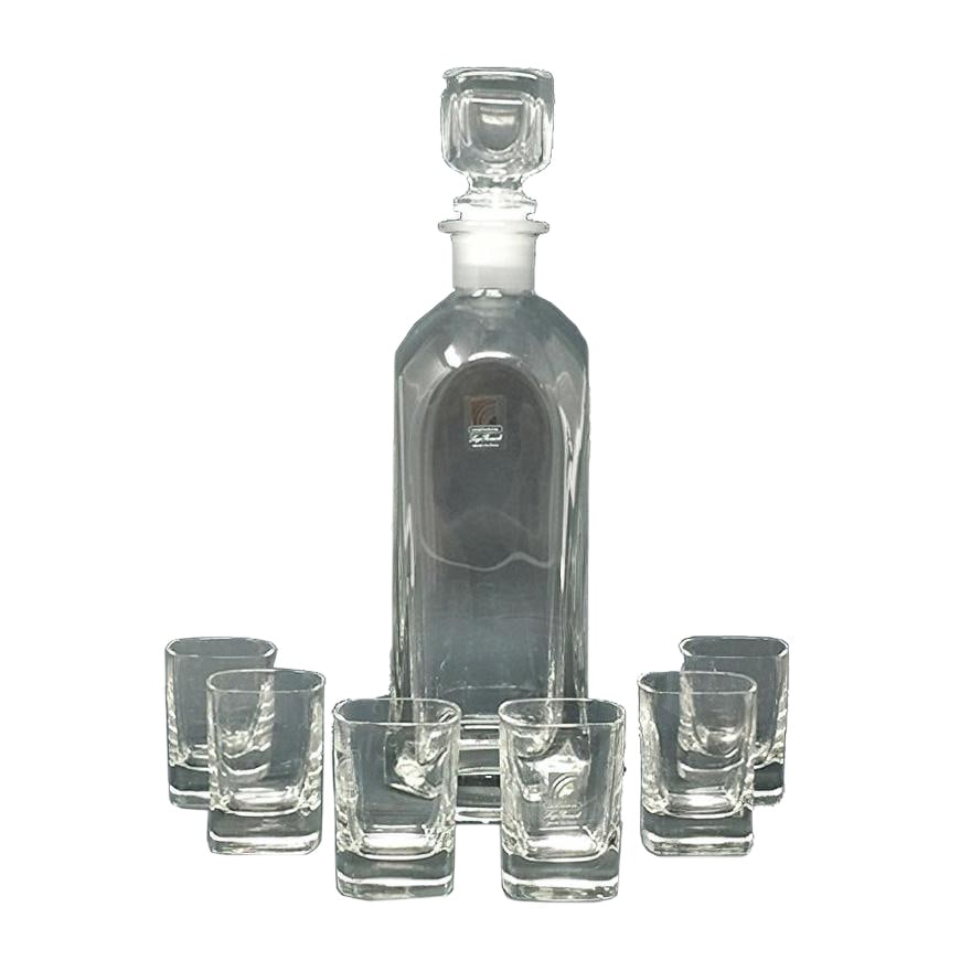 Decanter & Glasses Set by Luigi Bormioli, Set of 7: Astonishing Mid-Century vintage crystal decanter with 6 crystal glasses 1970s Made In Italy signed Luigi Bormioli Dimensions: Decanter 2,75 x 2,75 x 11,81 inch cm 7,5 x cm 7,5 x cm 30