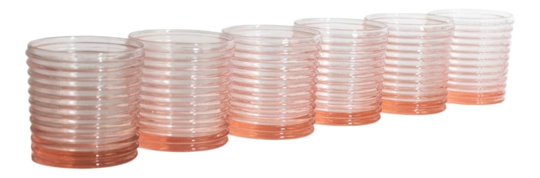 Art Deco Murano Glasses by Mariana Iskra, Set of 6: Jump back to Venice in the 90s and you find a fantastic drinking set made by a man who was holding artistry and character. These glasses have been made in a fantastic pink color very popular in the