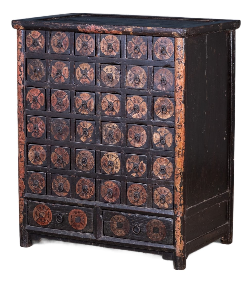 Antique Chinese Medicine Cabinet, 1930s: Beautiful and decorative antique Chinese medicine cabinet, likely dating from the 1930s. Featuring multiple small drawers and traditional craftsmanship, this piece is both functional and highly