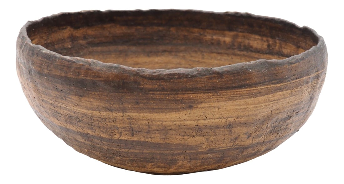 Bowl by Dagny Zachrisson, Sweden, 1970s: A heavy and rustic ceramic bowl in shades of brown with a real old vintage feel from the 70´s.A beautiful feature on the kitchen counter to serve fruit or bread in. Signed at the bottom.Dagny Zac