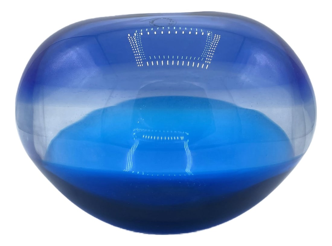 Laine Vase by Timo Sarpaneva for Venini, 1990: Venini's bulbous Laine vase, composed of three seamlessly connected horizontal bands, blending gently into each other, is made of blown crystal, sapphire, and aquamarine glass. The vase is by Finnish