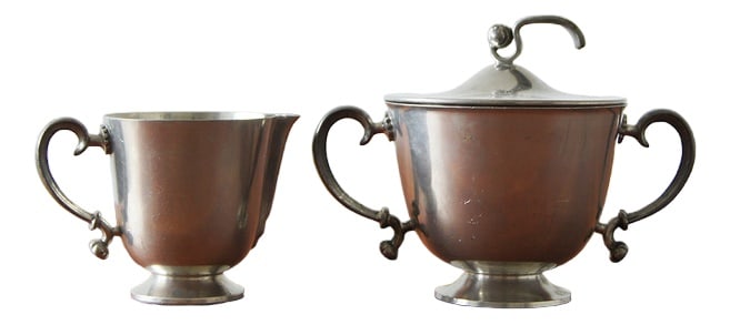Creamer and Sugar Bowl by Edvin Ollers, 1920: Set designed by Edvin Ollers for Schreuder & Olsson, Stockholm.Made of pewter in the Swedish grace style, which is the Swedish equivalent of Art Deco. Swedish Grace was a brief but significant