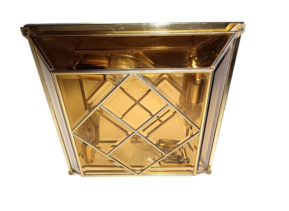 Modern Art Deco Murano Glass Ceiling Light, 1970s: A most eloquent testimony to the absolute craftsmanship of the "Bronzetto-Italy" ateliers, created in the 70s, made of Murano beveled amber glass, cased in Gold plated brass, truly an iconic masterwor