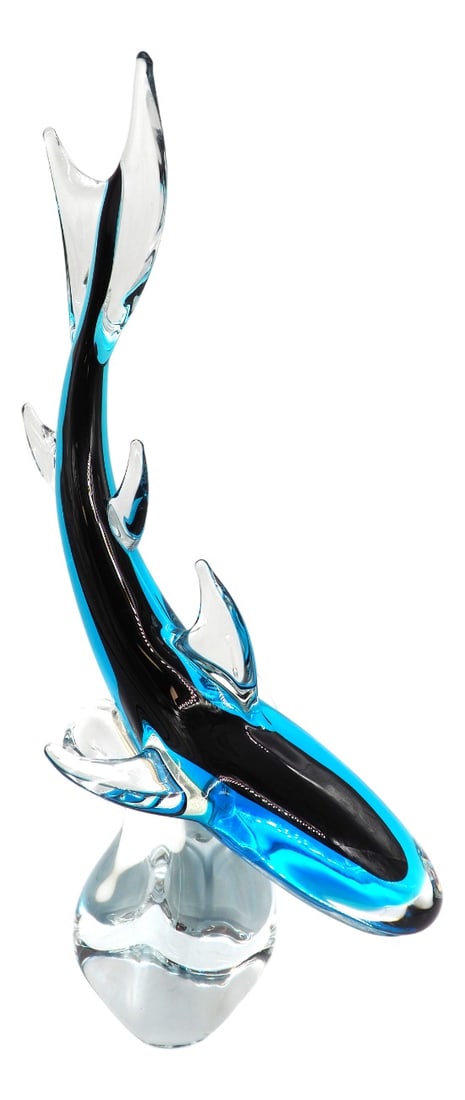 Glass Sculpture Shark, Färe Marcolin, Ronneby Sweden: A truly wonderful glass sculpture of a shark surfing on the wave. The light reflects so beautifully, and the blue color shines in the right light. This blue shark draw all eyes to it.The blue glass