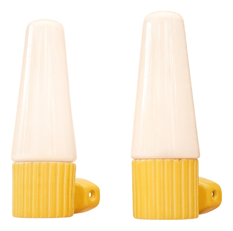 Wall Sconces by Hans-Agne Jakobsson for Ifö, Set of 2: A beautifully preserved pair of mid-century wall sconces designed by Hans-Agne Jakobsson for the iconic Swedish lighting manufacturer IFÖ. These refined fixtures exemplify Jakobsson’s