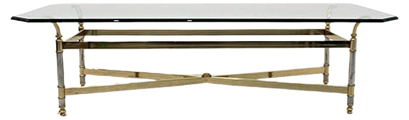 Brass, Chrome & Glass Center table, France 1970s: Sophisticated French Center table with a stunning Brass and Chrome frame with a beautiful graphical design and chique accents. The glass has facet sides and is very thick. This solid and glossy