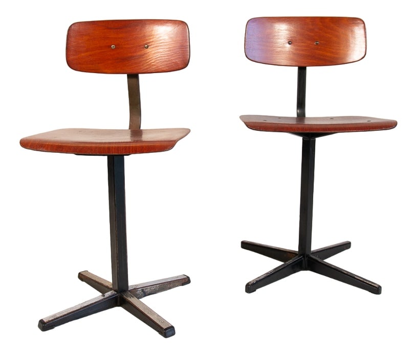 Set of Industrial School Chairs, 1960s: This pair of school chairs from the 1970s are similar but not identical, the maximum overall dimensions refer to the largest. They are made on a sturdy four-star steel base with Pagholz seat and
