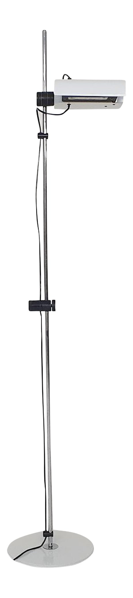 White Metal Floor Lamp, Italy, 1980s: Black and white metal floor lamp. The lamp has a built in dimmer in the button in the middle. Lamp shade can be adjusted in height and can rotate Works with a Halogen lamp. Country of Manufacture: