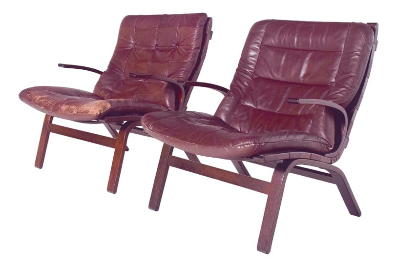 Set of Miljo Range Armchairs from Farstrup Møbler: Pair of Miljo Range armchairs for Farstrup, brown leather cushions on plywood frame, 1960s. Fantastic chairs with curved wooden frame with armrests and upholstered seat covered in brown leather.