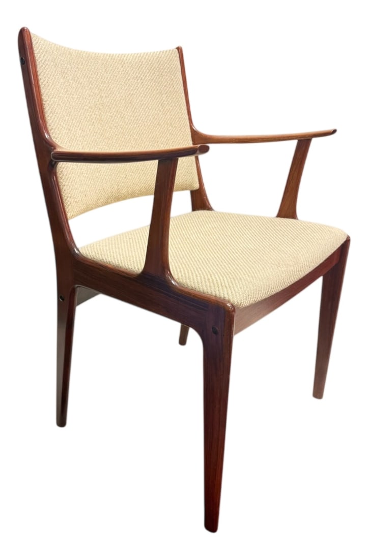 Armchair by Andersen for Uldum Møbelfabrik, 1960s: Danish mid-century modern armchair attributed to Johannes Andersen for Uldum Møbelfabrik, Denmark, 1960s.Crafted in rosewood with beautiful, rich grain. The sculptural organic frame and gently