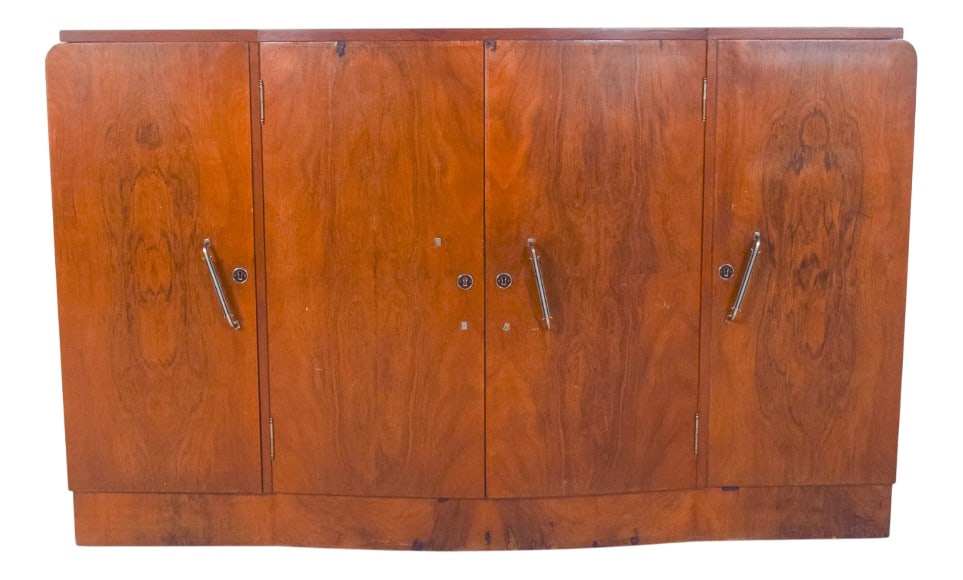 Vintage Portuguese Sideboard in Walnut, 1920: Four-door sideboard in walnut. The front is made up of four continuous doors, with slim vertical metal handles reinforcing the modern aesthetic of the piece and balancing the simplicity of the shapes