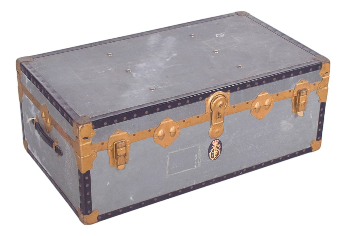 Mid-Century Suitcase in Grey Sheet Metal, 1950s: Antique suitcase in grey sheet metal. Structure reinforced by angle brackets and steel rivets painted black, characteristic of mid-20th century models. The piece is fitted with gold-plated brass
