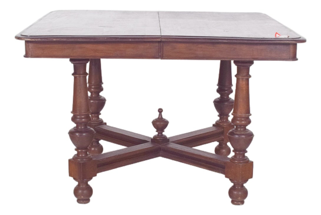 European Square Extendable Dining Table, 1890s: Oval-top table. With a folding structure and an ovalised shape when open, it features a dark wood that combines robustness and practicality, ideal for versatile environments.The top has two rounded fl